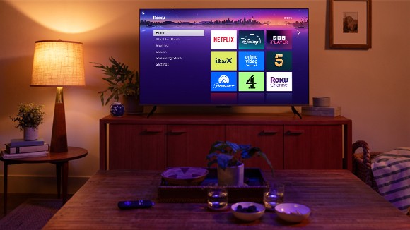 TV with the Roku UI screen in a family room