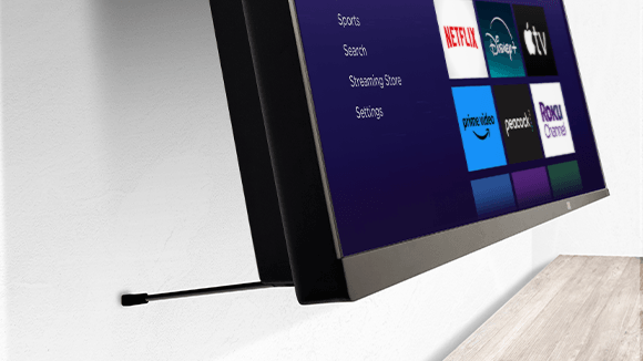 Roku Pro Series TV with a kickstand supporting the TV away from the wall.