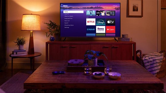 TV with the Roku UI screen in a family room