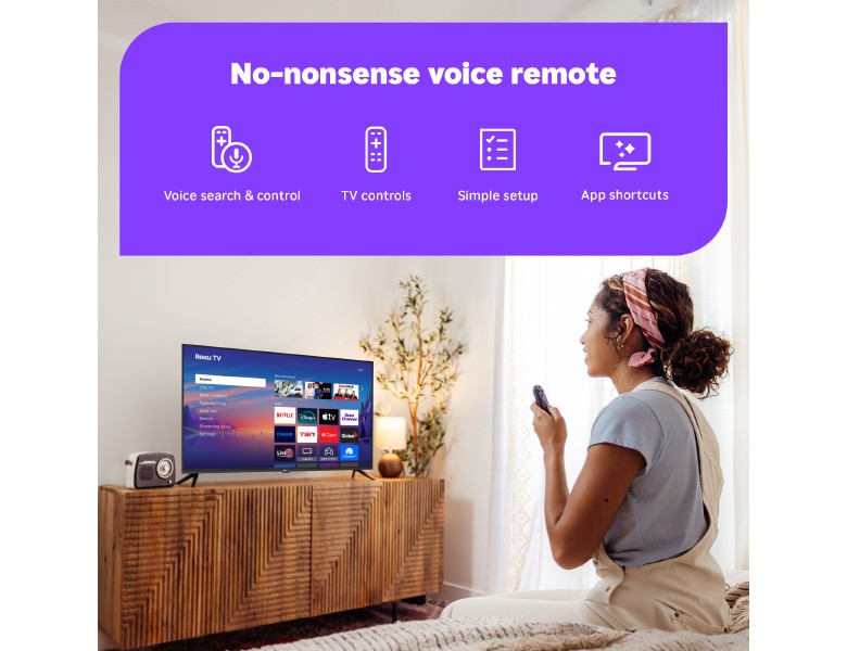 Person using the Roku Voice Remote to control their Roku TV