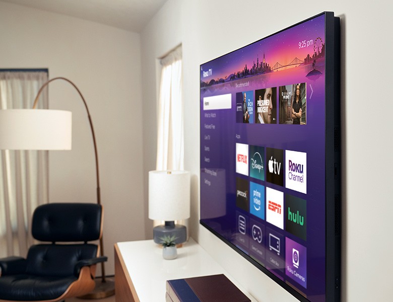 Side view of the Roku Pro Series TV mounted on a wall