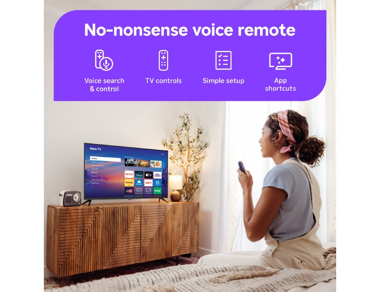 Person using the Roku Voice Remote to control their Roku TV