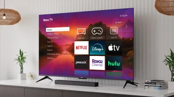 TV made by Roku in a living room