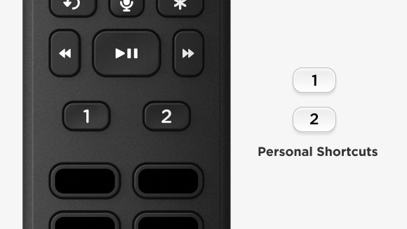 Close-up image of Roku Ultra’s Enhanced voice remote to show the personal shortcut buttons labeled “1” and “2”