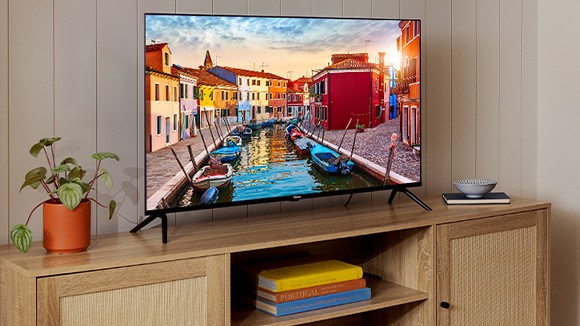 Roku Select Series HD TV on top of entertainment unit